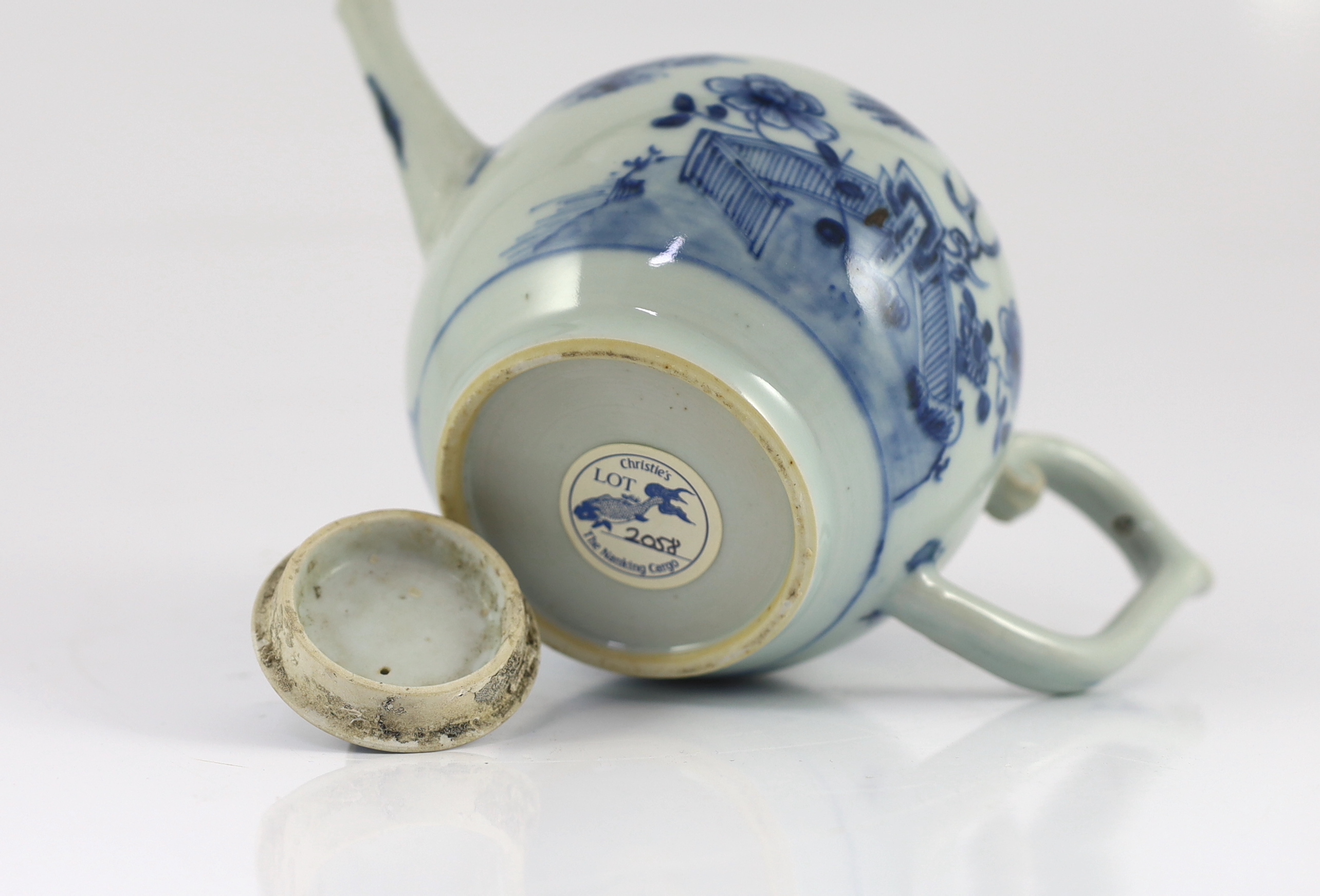 A Chinese blue and white bullet-shaped teapot and cover, Nanking Cargo, c.1750